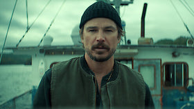 Josh Hartnett as Calvin Penney aboard a fishing boat in Netflix's Below