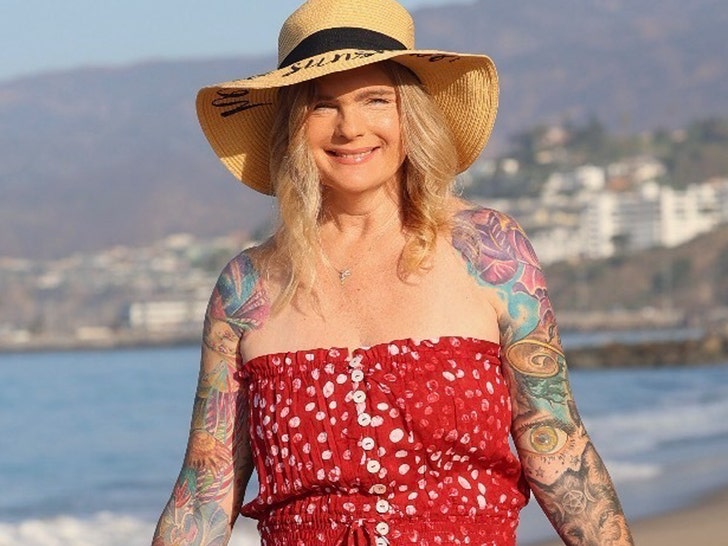 Erika Eleniak in a photo accompanying TMZ's report about her OnlyFans launch at age 56