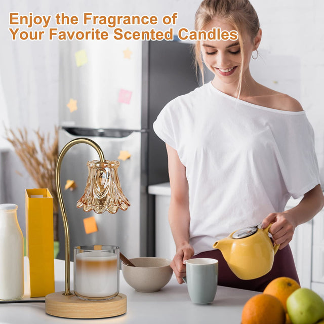 Woman in a bright kitchen beside a decorative candle warmer lamp with a flower-shaped shade. Illustrative reference for this article; exact model match not independently verified.