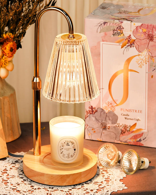 Funistree-style candle warmer lamp with decorative ribbed glass shade and wood base. Illustrative reference for this article; exact model match not independently verified.
