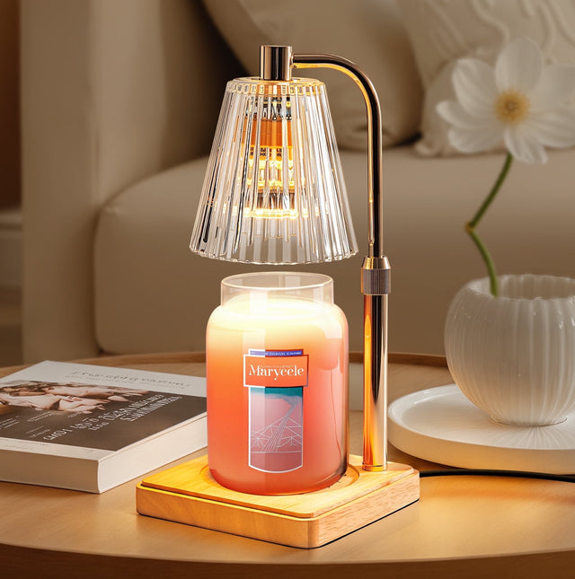 Marycele adjustable candle warmer lamp with gold arm, ribbed glass shade and wooden base. Illustrative reference for this article; exact model match not independently verified.