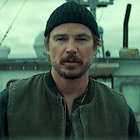 Josh Hartnett as Calvin Penney on a fishing boat in Netflix's Below