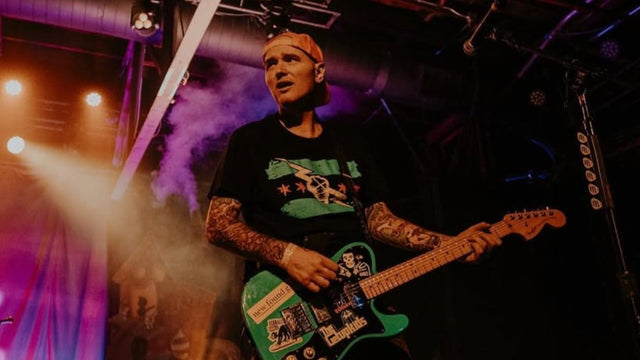 Chad Gilbert performing with New Found Glory