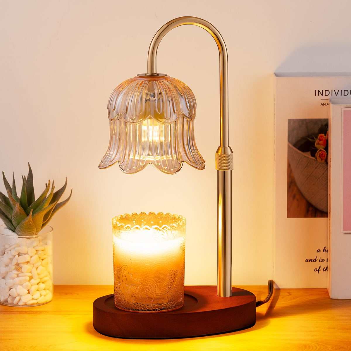 Vintage flower-shaped glass candle warmer lamp with brass-colored arm and wooden base