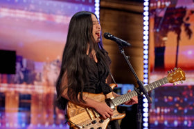 Nene Royal singing and playing electric guitar on America's Got Talent