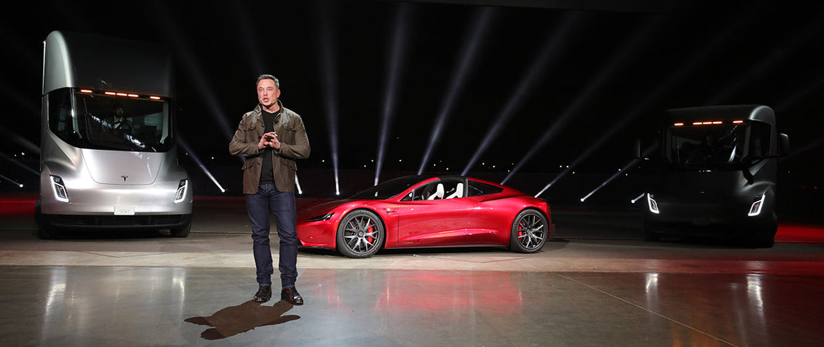 Tesla Roadster displayed beside Tesla Semi at the 2017 reveal